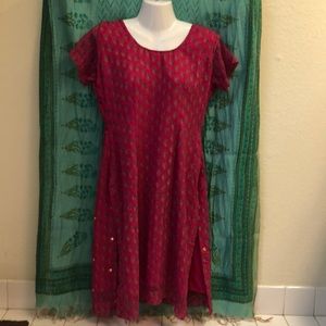 Smashing short sleeve red tunic.